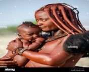 portrait of a young woman of the himba tribe with a small child in her arms 2r415hp.jpg from indian upojati mom and son