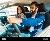 happy loving arab couple holding hands while sitting in new auto middle eastern guy having car trip with his girlfriend 2rd0mj8.jpg from arab couple in the car