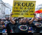 london uk 1st july 2023 a representative of the say it loud club holds up a sign reading proud to be a gay bangladeshi living in the uk during the pride in london parade over a million people watched the 51st annual pride parade in which an estimated 30000 people took part from over 600 organisations including many lgbt community groups credit mark kerrisonalamy live news 2radbhr.jpg from bangladeshi loud