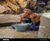 woman bathing in small town well outside bagan myanmar m45xgj.jpg from village dressing after bath video