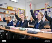 students raise their hands in class at royal high school bath which is a day and boarding school for girls aged 3 18 and also part of the girls day school trust the leading network of independent girls schools in the uk pn053y.jpg from تيل تشادn school girls xxx 10 @1 12 13 14 15 16 17 18 com
