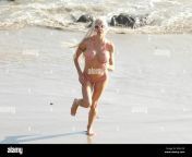 celebrity big brother star frenchy morgan wearing a tiny bikini while jogging on the beach in malibu featuring frenchy morgan where malibu california united states when 29 oct 2018 credit wenncom r5a1yw.jpg from women in tiny bikini