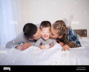 mom dad and young son sleep on the bed bedroom r9w0ry.jpg from dad sleeping mom and son