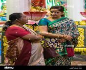 hindu temple sri maha mariamman two middle aged women talking george town penang malaysia rt5jdw.jpg from midle age aunty