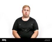 big fat stout blonde man looking at camera with upset disappointed expression emotion isolated on white background r1a4pg.jpg from camera big fat