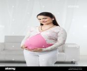 pregnant woman standing w70p03.jpg from pregnant bhabh
