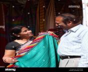 old couple purchasing saree at a market stall surajkund faridabad haryana india w62em8.jpg from saree mature aunti