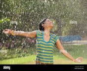 indian young woman enjoying rain w07ccm.jpg from bubbly young indian babe enjoyed by boyfriend on cam