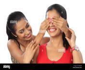 woman covering her friend39s eyes w3834b.jpg from give milk to my friend39s hair so she can comb her hair