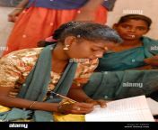 stock image of young indian girl writing in school in a tribal village a4b93x.jpg from tamil nadu village school grils sex tamil 3gp videoshoot sexaunty iduppu