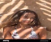 portrait of teenage girl 13 14years wearing bikini in dappled shade ar4wb2.jpg from bikini girl13 jpg