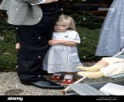 shy girl hiding behind fathers leg a0f1fn.jpg from little shy doughter with father dad