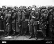 german p o ws wait to be processed at a prison camp in france ww2 b44hka.jpg from o5pixt0xxgnm jpg