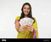 a rich asian woman of indian origin with currency notes b4x5m3.jpg from today special indian rich girlfriend boyfriend enjoy he