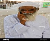 omani man speaking on his mobile phone muscat bbaabf.jpg from omani mobil