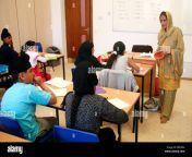 a female teacher taking a punjabi lesson in hounslow gurdwara england bpd8ea.jpg from punjabi teacher and stude