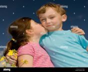 young boy and girl kissing in a summer field b13m94.jpg from 10 yr kissing