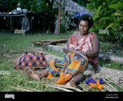woman knotting a bilum string bag biliau papua new guinea melanesia b1rgn2.jpg from female knotting