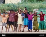 happy young rural indian village children laughing waving and smiling c7x8kf.jpg from villege chilld