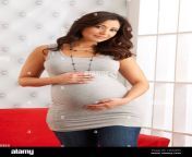 beautiful expecting mother at six months pregnant holding belly in cwxawn.jpg from pregnant six com
