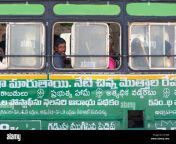 smiling indian man on an indian bus andhra pradesh india c0139k.jpg from bus window