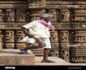 an elderly man in a traditional dhoti descends steps at the konark d4bc3g.jpg from indian old man dhoti bath nude penis
