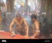 hindu pilgrims bathing in hot springs below the badrinath temple india dgdejw.jpg from indian hindu hot bathing in ganga