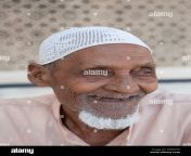 islam portrait muslim old man with a beard wearing a cap sitting in dgwcfk.jpg from indian muslim old man