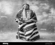 lucy red cloud sioux indian woman full length standing facing slightly dyhhja.jpg from indian lucy