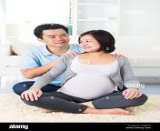 asian pregnant couple giving massage to wife dxarc0.jpg from pregnant wife want sex massage from old man
