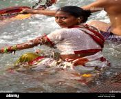 woman bathing in the ganges river at the third shahi snan kumbh mela d384xd.jpg from ganga nadi snan in ladies o
