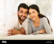 beautiful young indian married couple lying on bed ey0kj6.jpg from indian married anties hard fuck