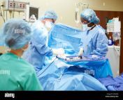 surgical team working in operating theatre e3kag9.jpg from nurse aur doctor operation theatre me nurse ka blause phada xxx photo