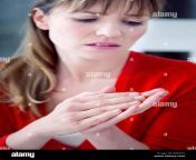 woman with painful hand e0cg73.jpg from painful
