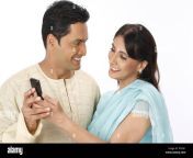 husband showing massage on his mobile to wife mr 703r703s ffxc41.jpg from desi tel malish pati patni sex