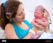 mother giving birth to a baby newborn baby in delivery room mom holding f0be1p.jpg from ሲክስ ቪዲዮ የሀበሻ gnxx baby delivery downloadn xxx phot