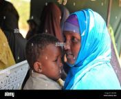 a mother with her child attend a meeting with officials from the african gkkr8k.jpg from somali mom sex son