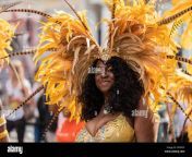 beautiful black west indies woman wearing a very colourful yellow gpr9cp.jpg from vestendij sexi vidoe