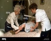 community nurse with patient at home with ageing mother assisting jatfyb.jpg from daughter fucking with patient
