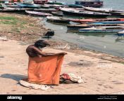 varanasi india march 14 2016 vertical picture of indian old man dressing kj83h7.jpg from indian old man dhoti bath nude penisony