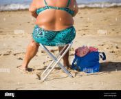 rear view of elderly woman in bikini on beach in spain kmawrn.jpg from dubai very fat anty sex pg