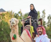 image 73476 saudi gulf arab woman riding arab camel next her saudi preview.jpg from পড়শি video 3xxx saudi arab habesha girl and boyfren
