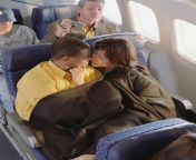 a couple cuddle on a plane 335501.jpg fromsex
