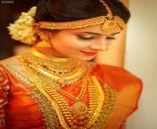 kerala wedding jewellery sets weva photography nagapada thali.jpg from kerala malayali servent