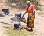 villager preparing food in rural kenya.jpg from kenyan local